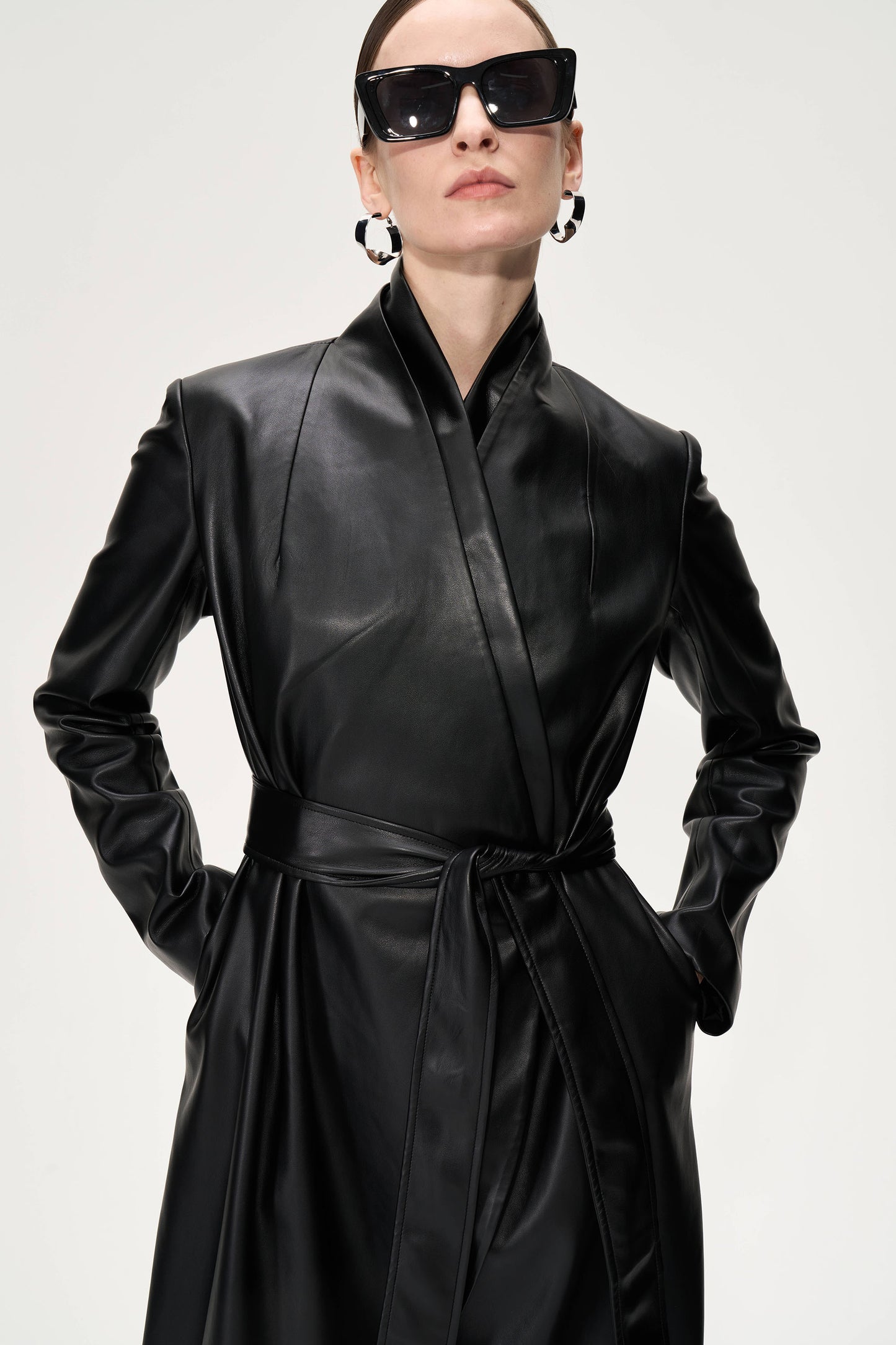 Sleek Belted Leather Trench Coat